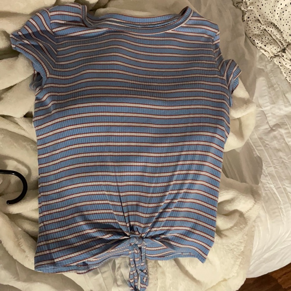 Blue t-shirt and orange and white stripes